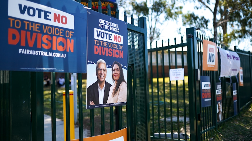 posters for the no to indigenous voice to parliament hang outside a polling centre in the western sydney suburb of blacktown