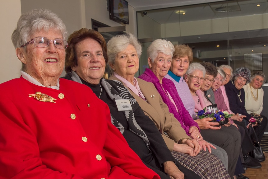 Older women sitting in a row