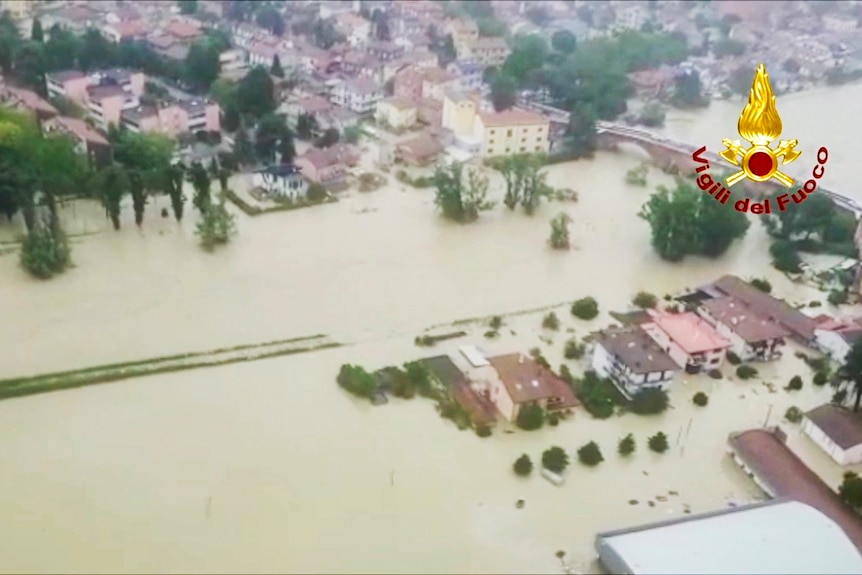 Aerial view of a suburb covered in flood water. 