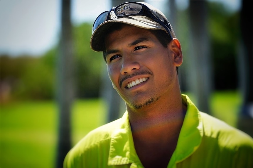 Ben Rioli photographed in a park.