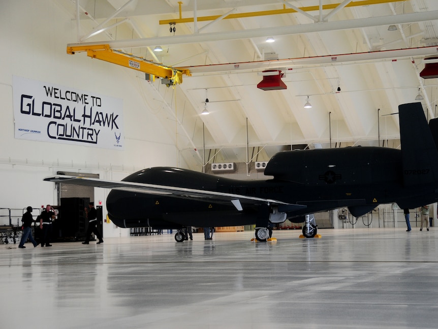 A Global Hawk spy drone inside a hangar at Andersen Air Force Base on Guam.