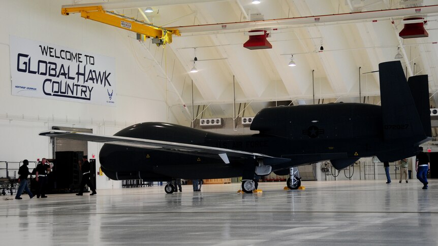 A Global Hawk spy drone inside a hangar at Andersen Air Force Base on Guam.