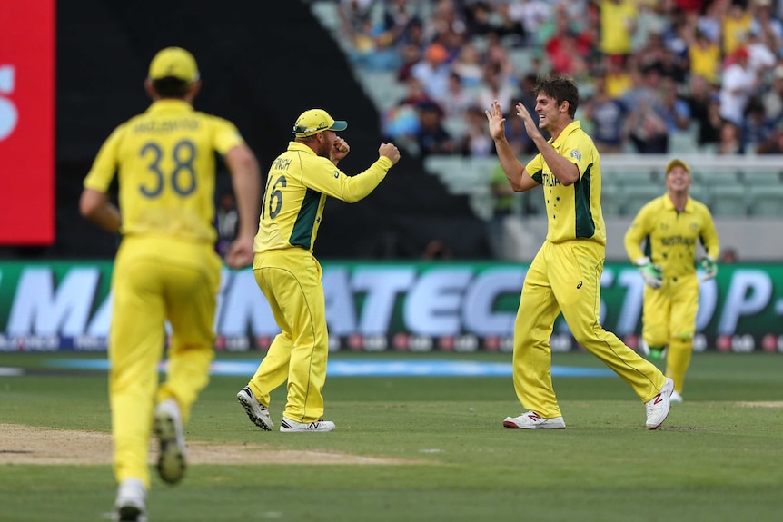 Aaron Finch and Mitchell Marsh celebrate the wicket of Gary Ballance