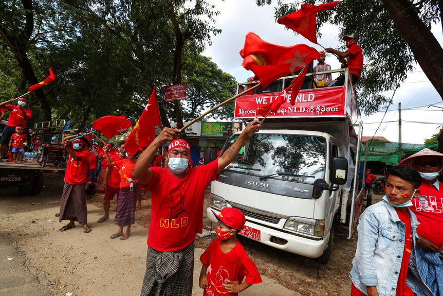 Supporters wearing shirts with logos of the Myanmar Leader Aung San Suu Kyi's National League for Democracy (NLD).