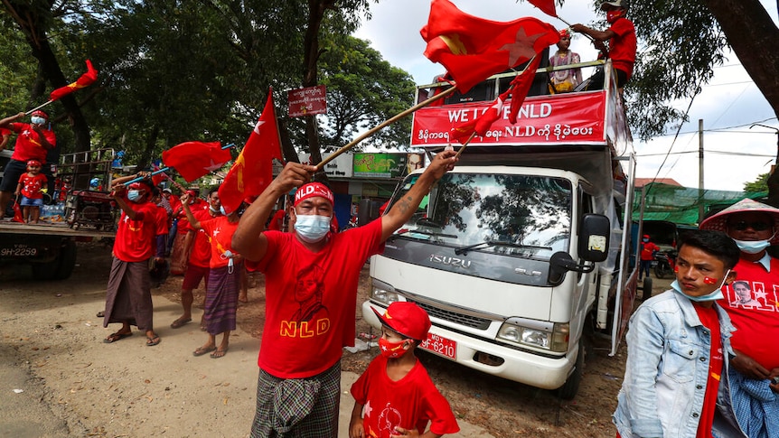 Supporters wearing shirts with logos of the Myanmar Leader Aung San Suu Kyi's National League for Democracy (NLD).