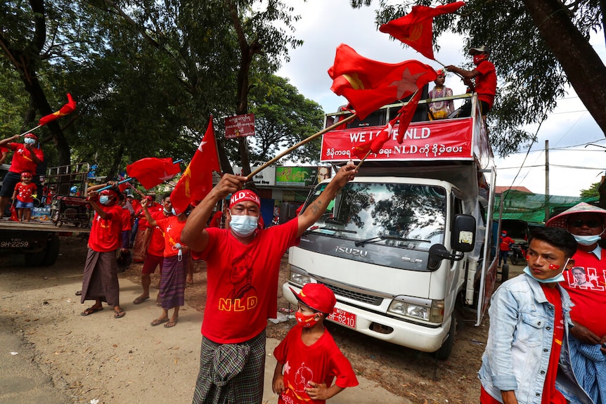 Supporters wearing shirts with logos of the Myanmar Leader Aung San Suu Kyi's National League for Democracy (NLD).