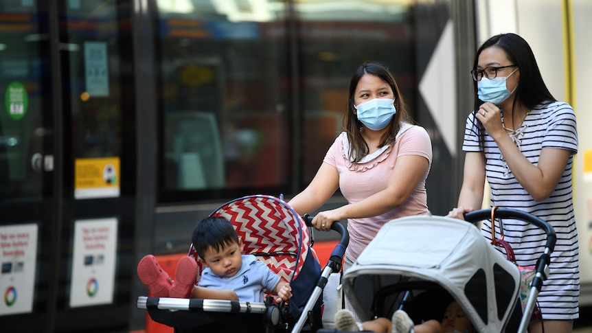 Two women in masks in Sydney