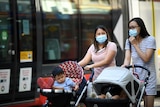 Two women in masks in Sydney