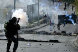 Tear gas fired at Palestinian protesters