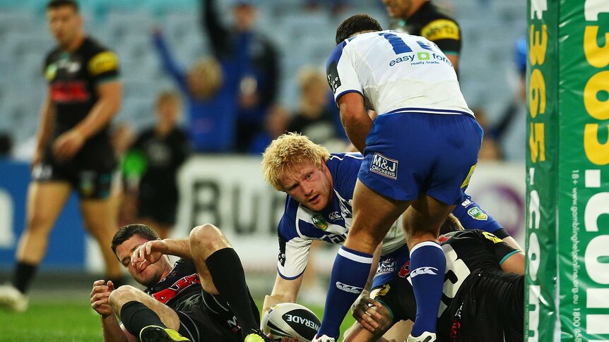 On song ... James Graham scores for the Bulldogs against the Panthers
