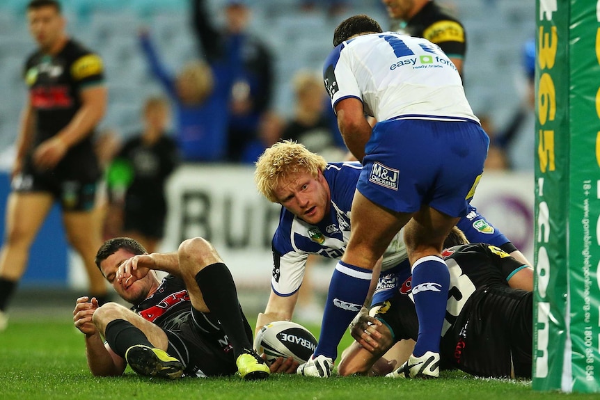 On song ... James Graham scores for the Bulldogs against the Panthers