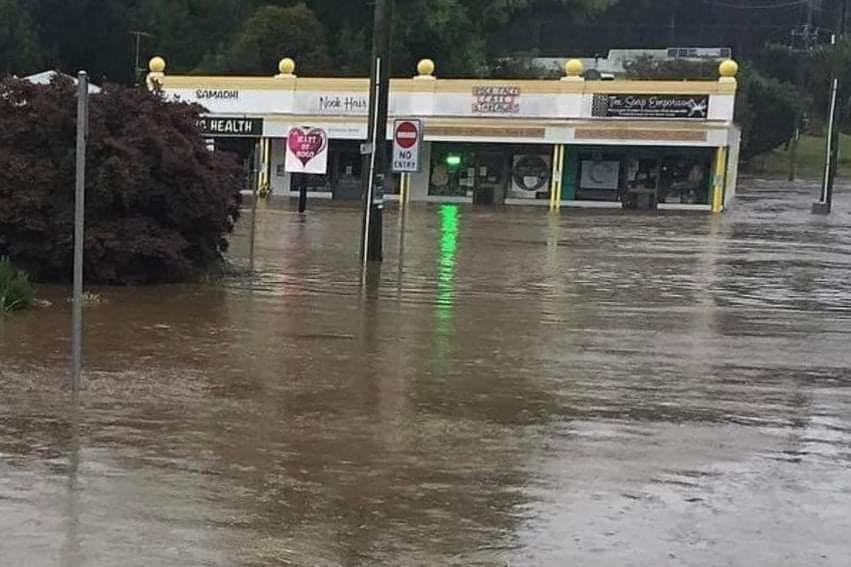 Major flooding around shops.