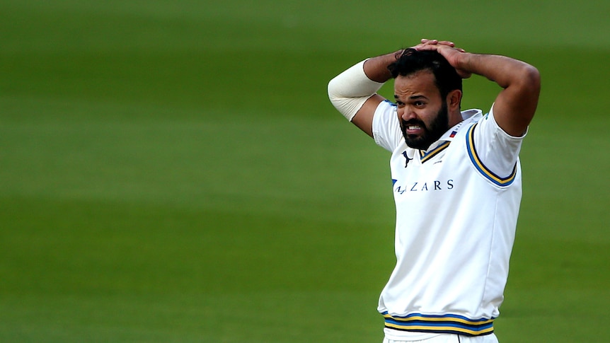 Yorkshire's Azeem Rafiq looks on frustrated as his team struggle during a match