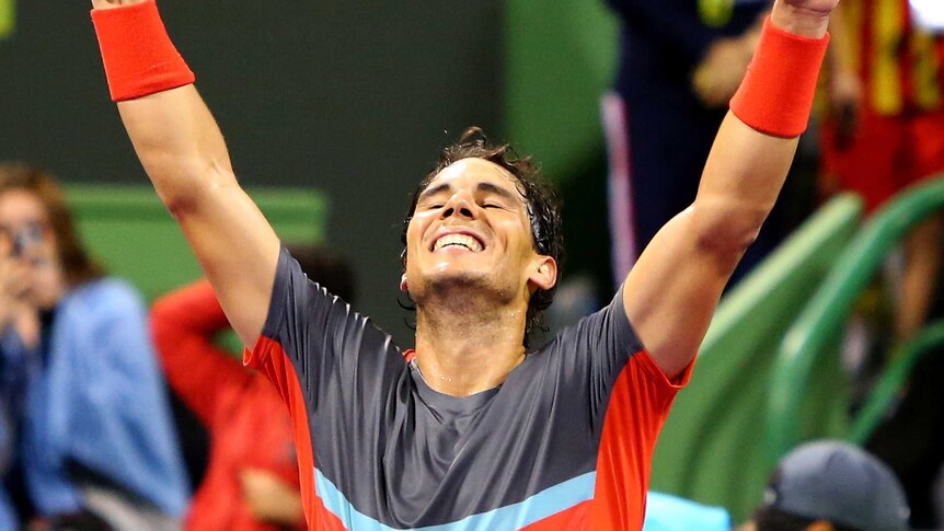 Spain's Rafael Nadal celebrates after beating France's Gael Monfils to win the Qatar Open.
