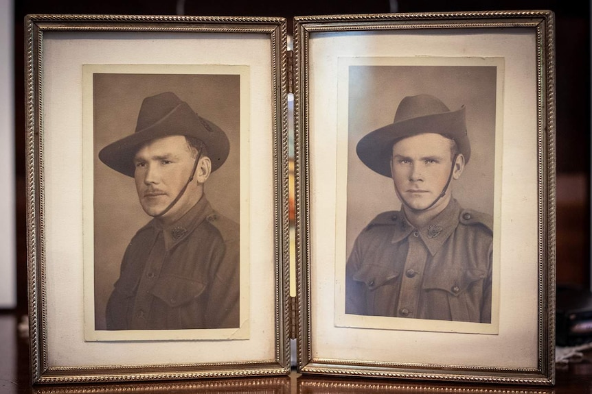 Photos in frames of WWII Australian soldiers James and Edley Simmons, dressed in their uniforms.