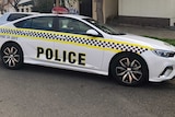 A police car outside the school