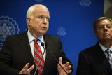 US Republican Senator John McCain (L) and Republican Senator Lindsey Graham (R) address a news conference on August 6, 2013 in Cairo, Egypt. (AFP: Gianluigi Guercia)