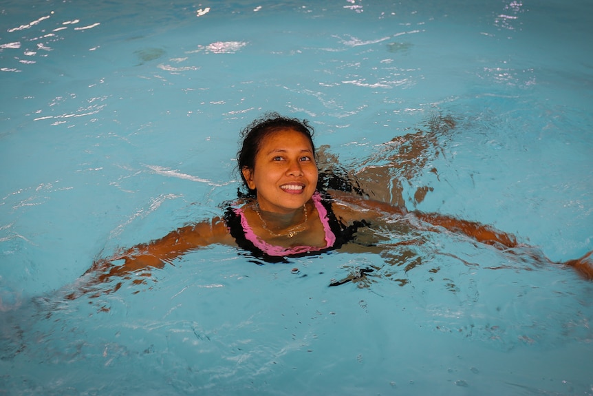 Doris Kristianti swimming in a pool