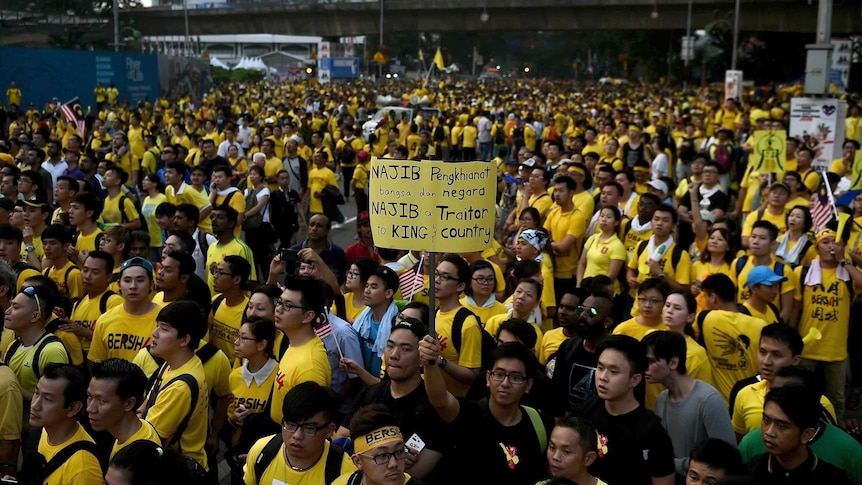Protesters march to demand resignation of Malaysia's prime minister Najib Razak