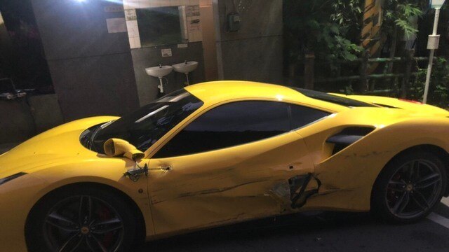 Damage to the yellow Ferrari after being struck by Mr Lin's van.