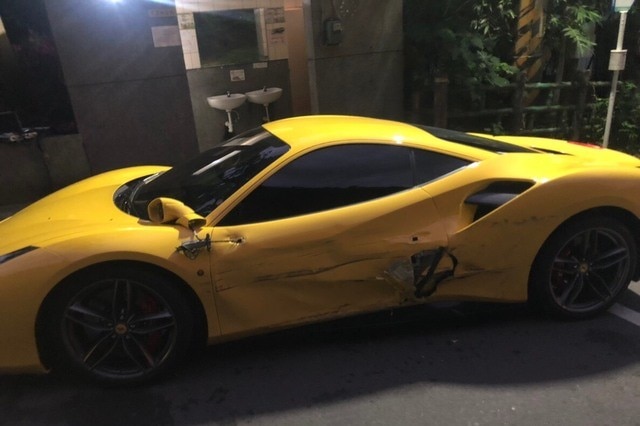 Damage to the yellow Ferrari after being struck by Mr Lin's van.