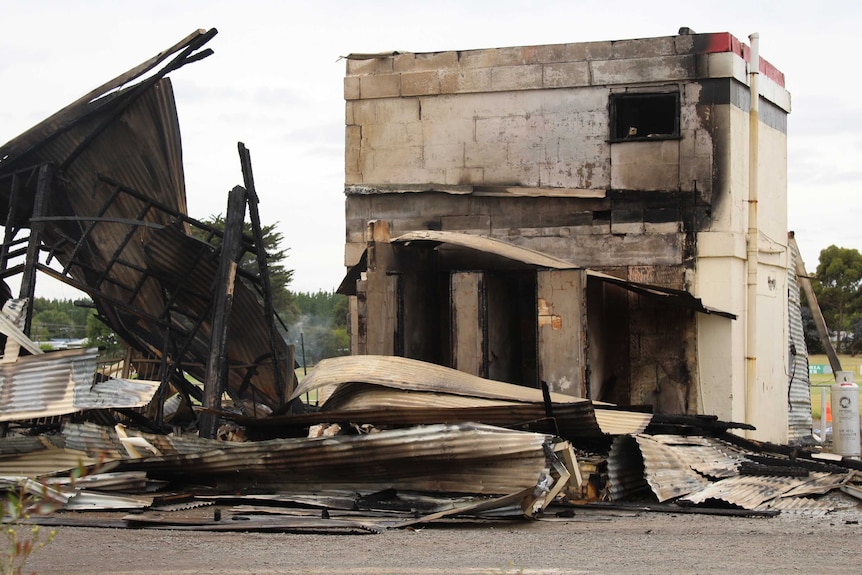 The burned remains of the building.