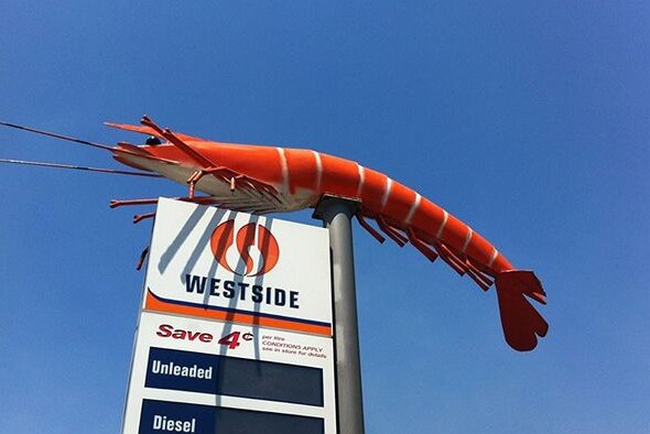A giant fake prawn on top of a service station sign at Crangan Bay