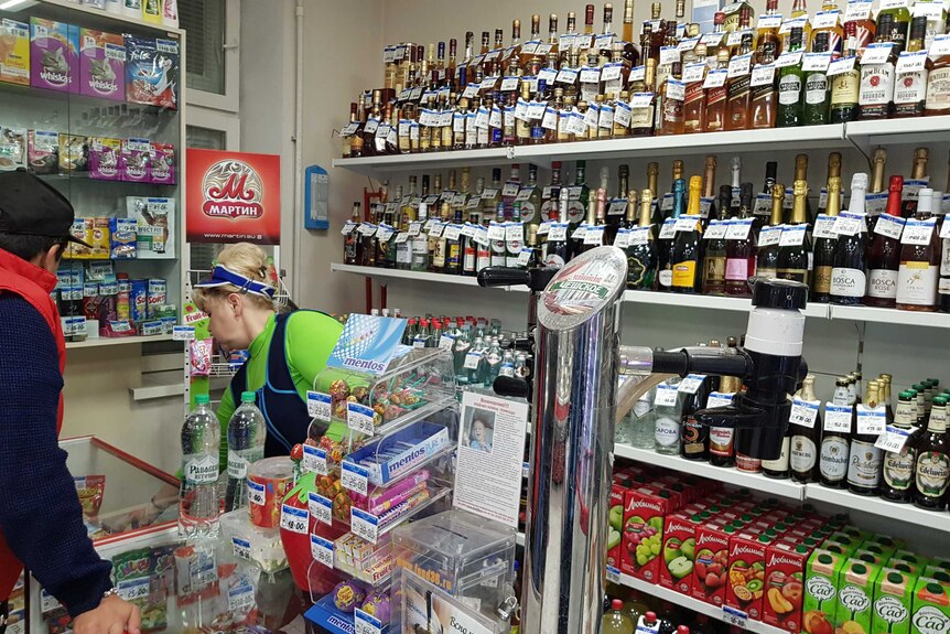Beer on tap in a Russian corner store.