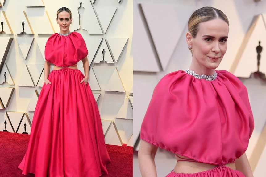 Sarah Paulson wears a big, hot pink dress to the Oscars.
