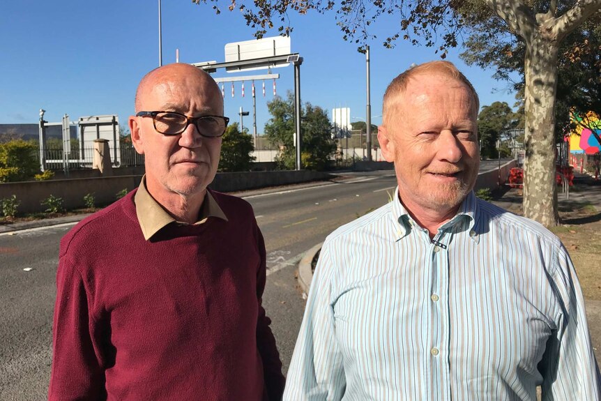 Alan Rosendale and Paul Simes standing on South Dowling Street near Moore Park.