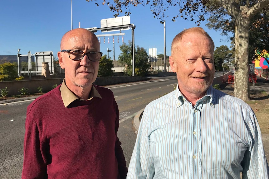 Alan Rosendale and Paul Simes standing on South Dowling Street near Moore Park.
