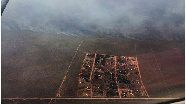 This aerial image shows how close the fire has come to the Twelve Mile community, near Broome.