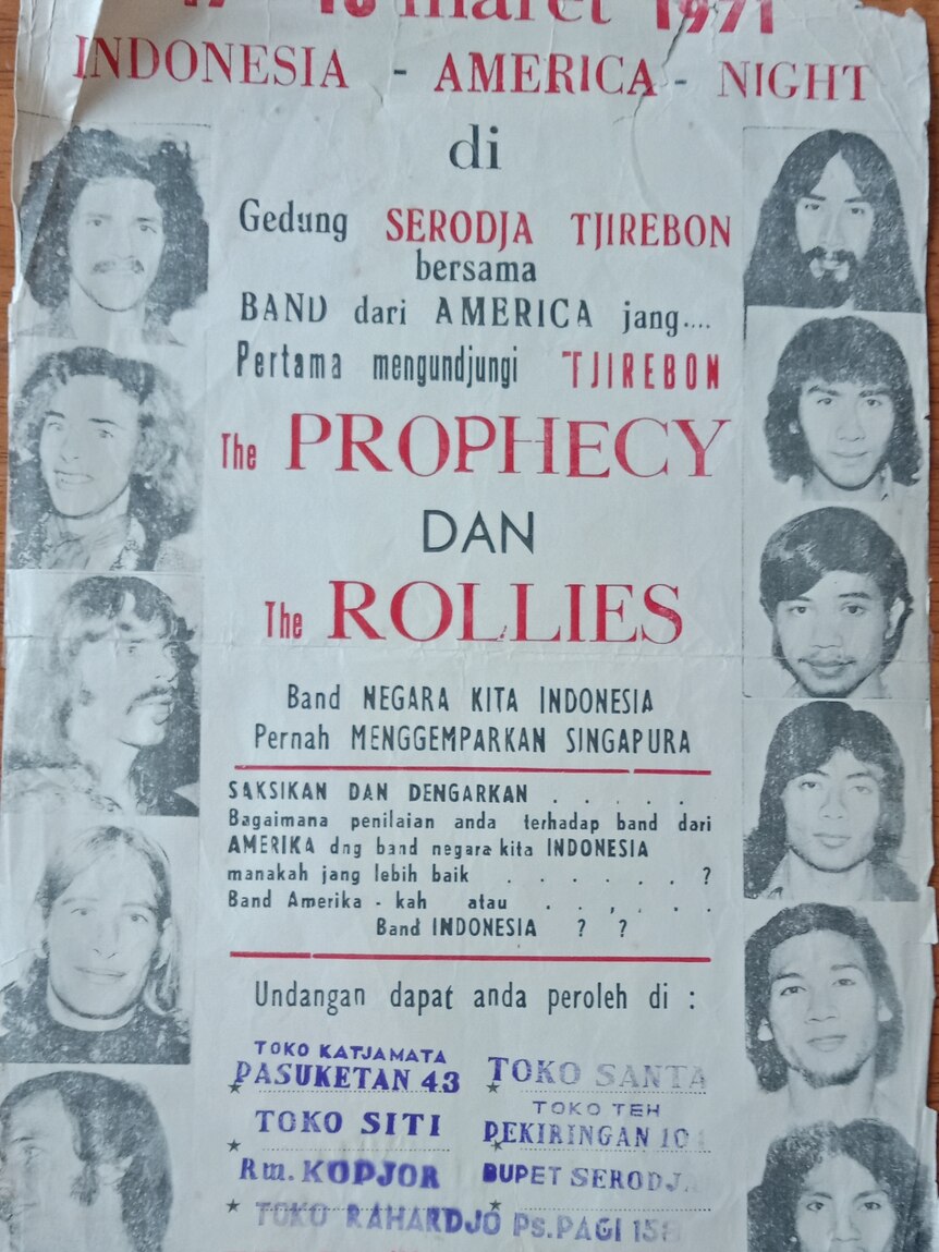 a poster with some faces and text