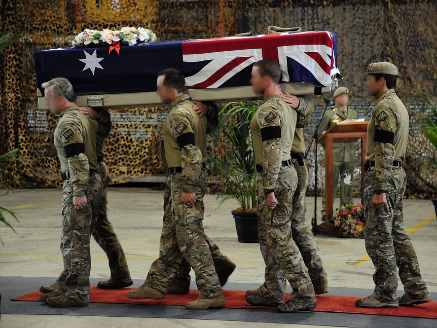 Bearer Party marches off the casket of Sergeant Blaine Diddams after a Repatriation Service at RAAF Base Pearce, WA.