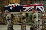 Bearer Party marches off the casket of Sergeant Blaine Diddams after a Repatriation Service at RAAF Base Pearce, WA.