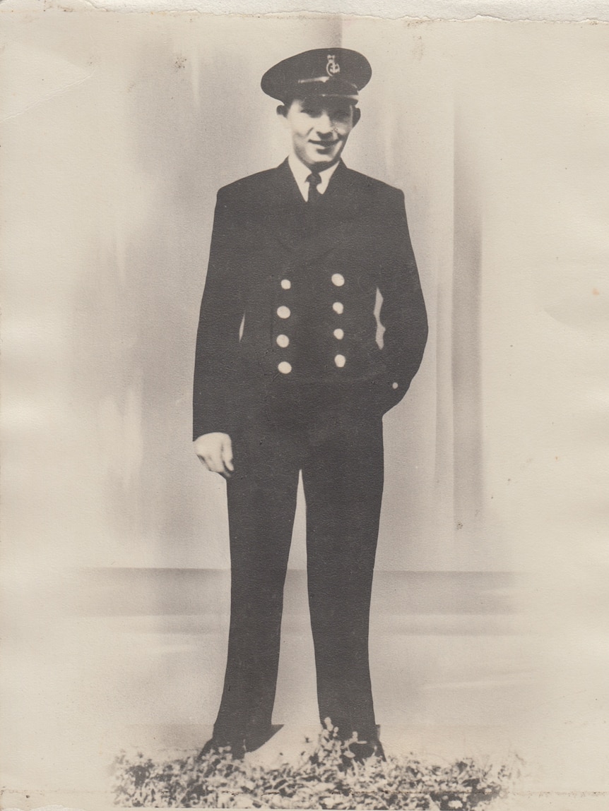 Black and White portrait of Fred Wallace in his Navy uniform.