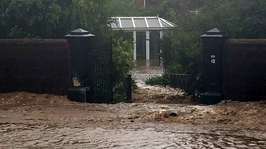 Flood water rises around home on Brownhill Creek Road.