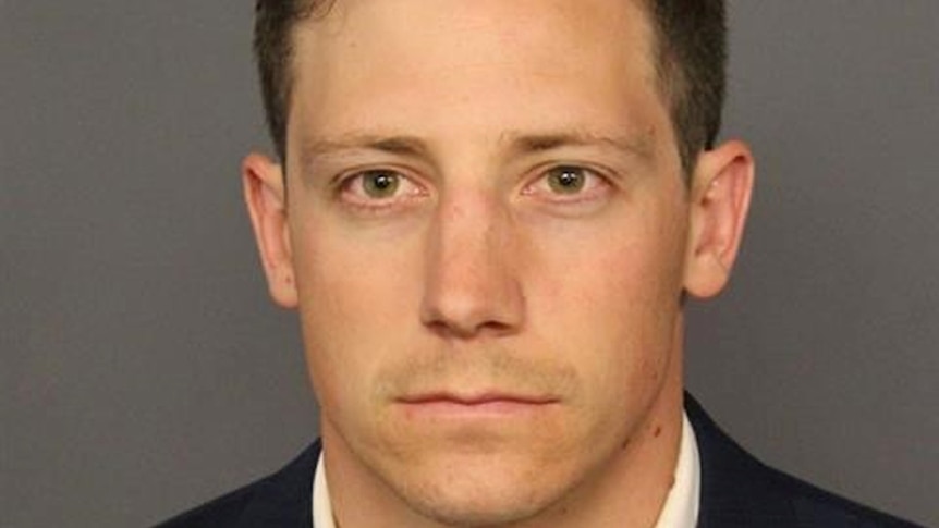 Head shot of Chase Bishop, the FBI agent who was charged after accidentally shooting his gun at a person while dancing in a bar.