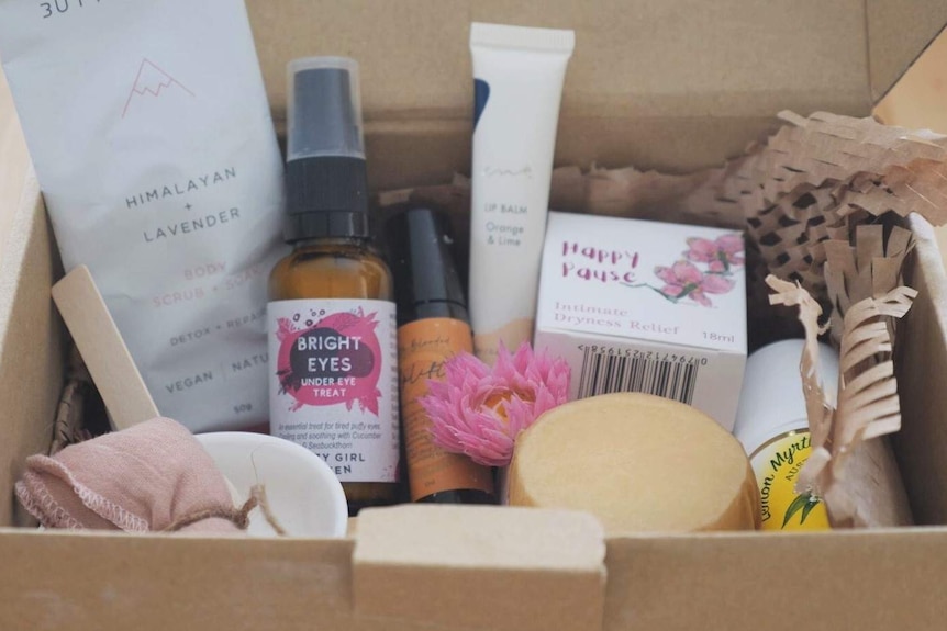 A box full of toiletries, makeup and goods.