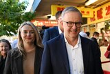 Anthony Albanese walks down an Eastwood street