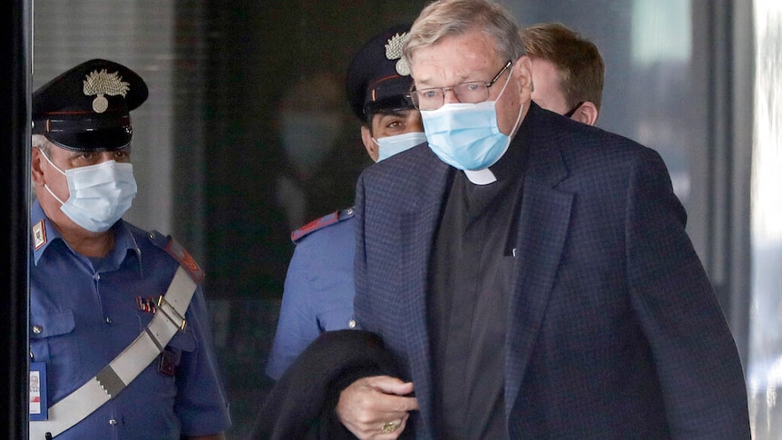 Australian Cardinal George Pell arrives at Rome's international airport in Fiumicino.