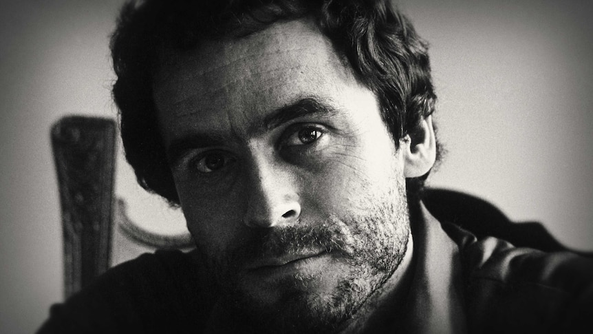 A black and white portrait of American serial killer Ted Bundy.