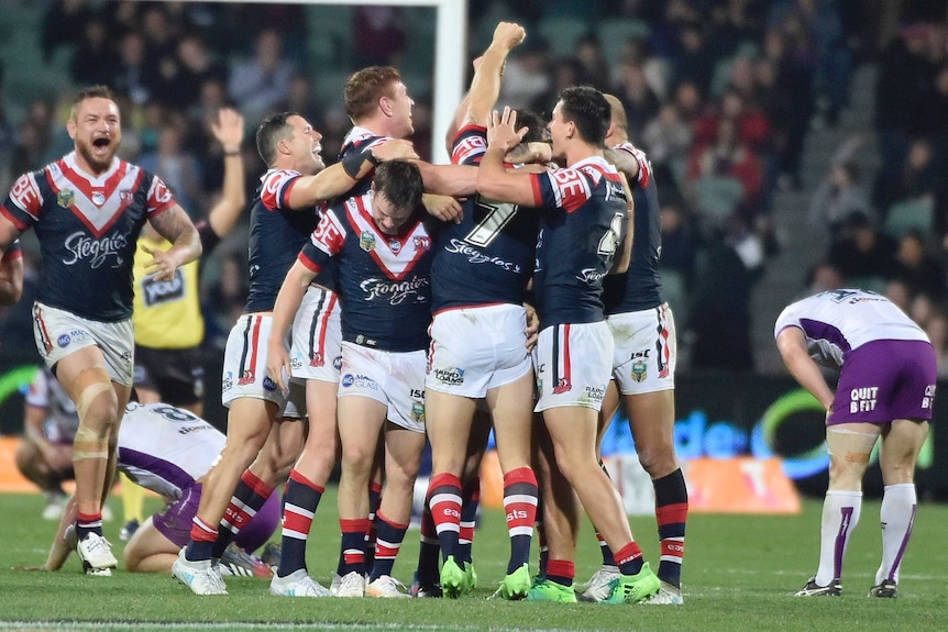 Roosters players celebrate golden-point win over Melbourne Storm at Adelaide Oval on June 24, 2017.