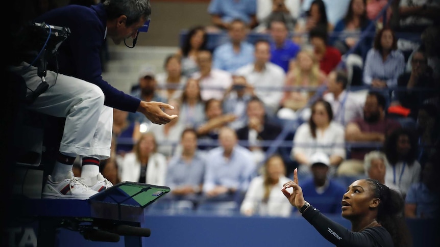 Serena Williams calls for the referee after arguing with the chair umpire during her defeat to Naomi Osaka