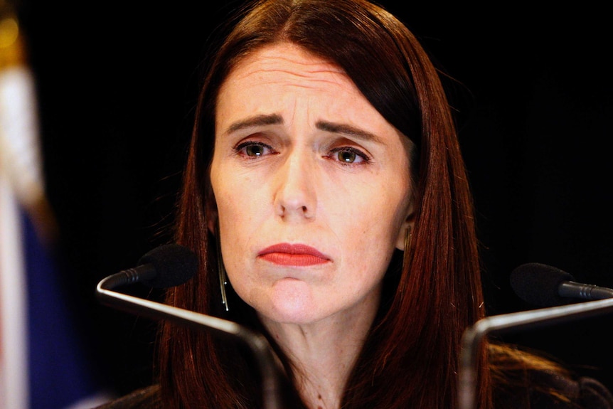 New Zealand Prime Minister Jacinda Ardern looks forlorn as she stares into the distance