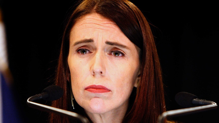 New Zealand Prime Minister Jacinda Ardern looks forlorn as she stares into the distance