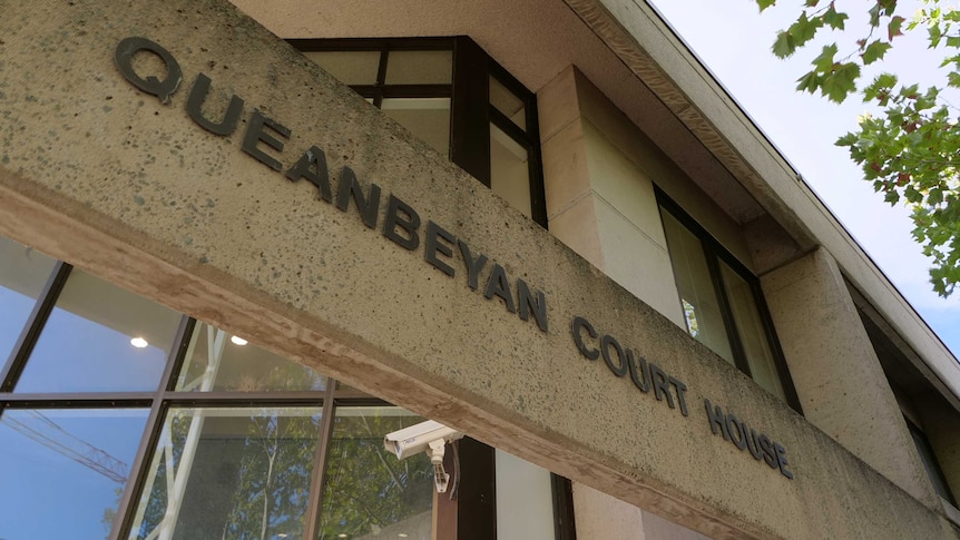 Signage for the Queanbeyan Court House on the exterior of the building.