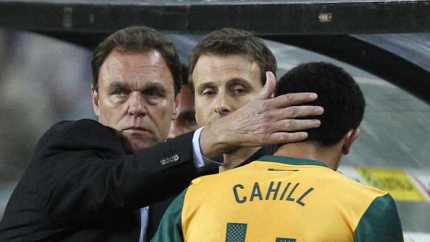 Great relationship ... Holger Osieck (l) and Tim Cahill during the Socceroos' friendly against Paraguay