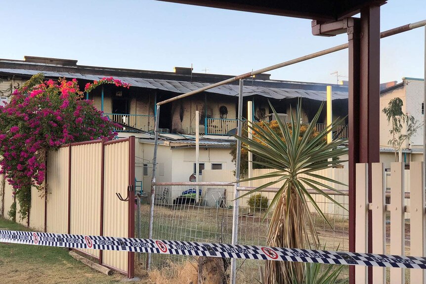 The fire-ravaged back of the Lyceum Hotel in Longreach with police tape around building on July 15, 2018.