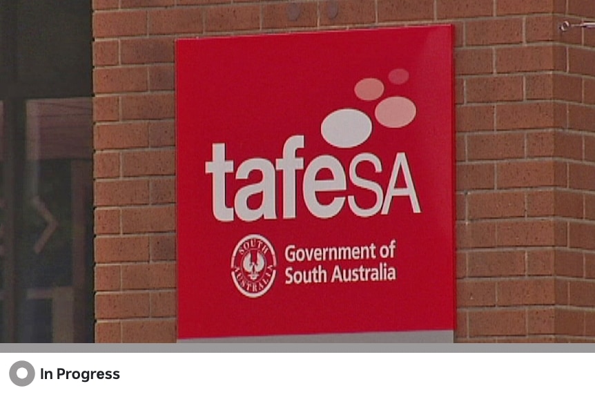 A red sign which reads "TAFE SA"